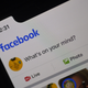 A Facebook newsfeed page is displayed on a smartphone.